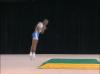 C 157 : FREE FALL 1½ TWIST AIRBORNE TO 1 ARM PUSH UP