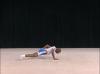 C 397 : COSSACK JUMP ½ TWIST TO 1 ARM PUSH UP OR TO WENSON 